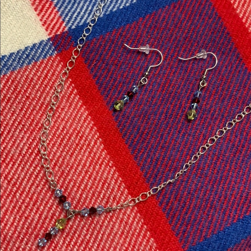 NWOT, Earring and matching necklace set .